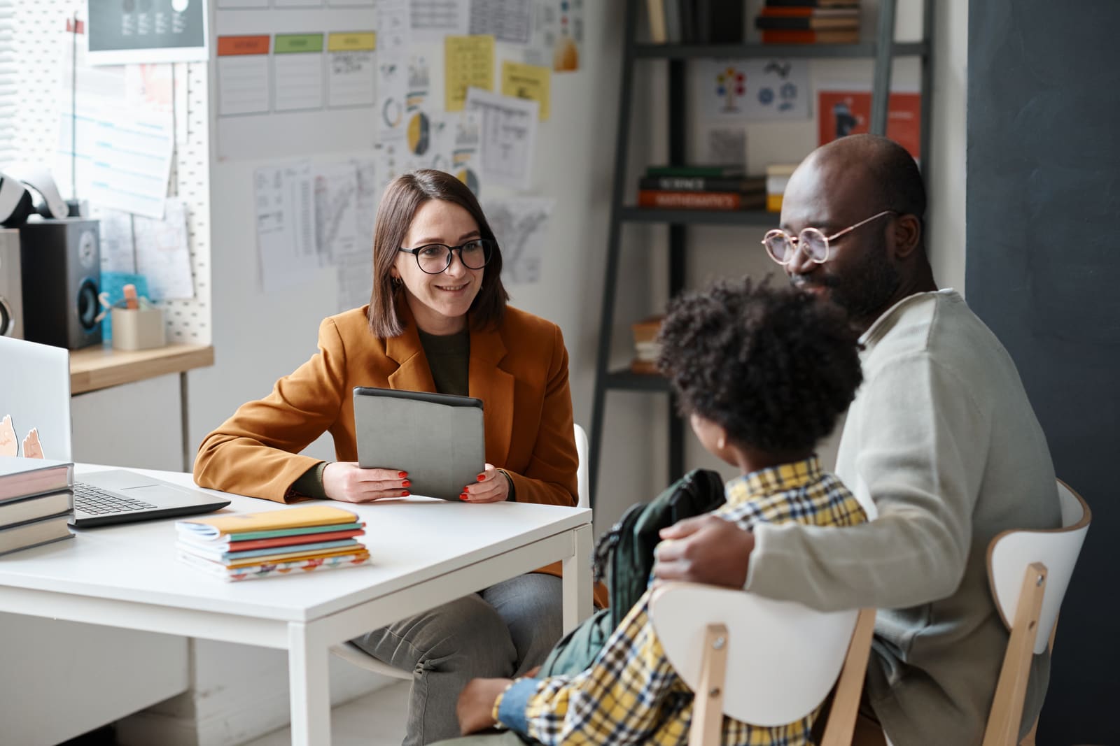 A school counselor reviewing college and career plans with a student